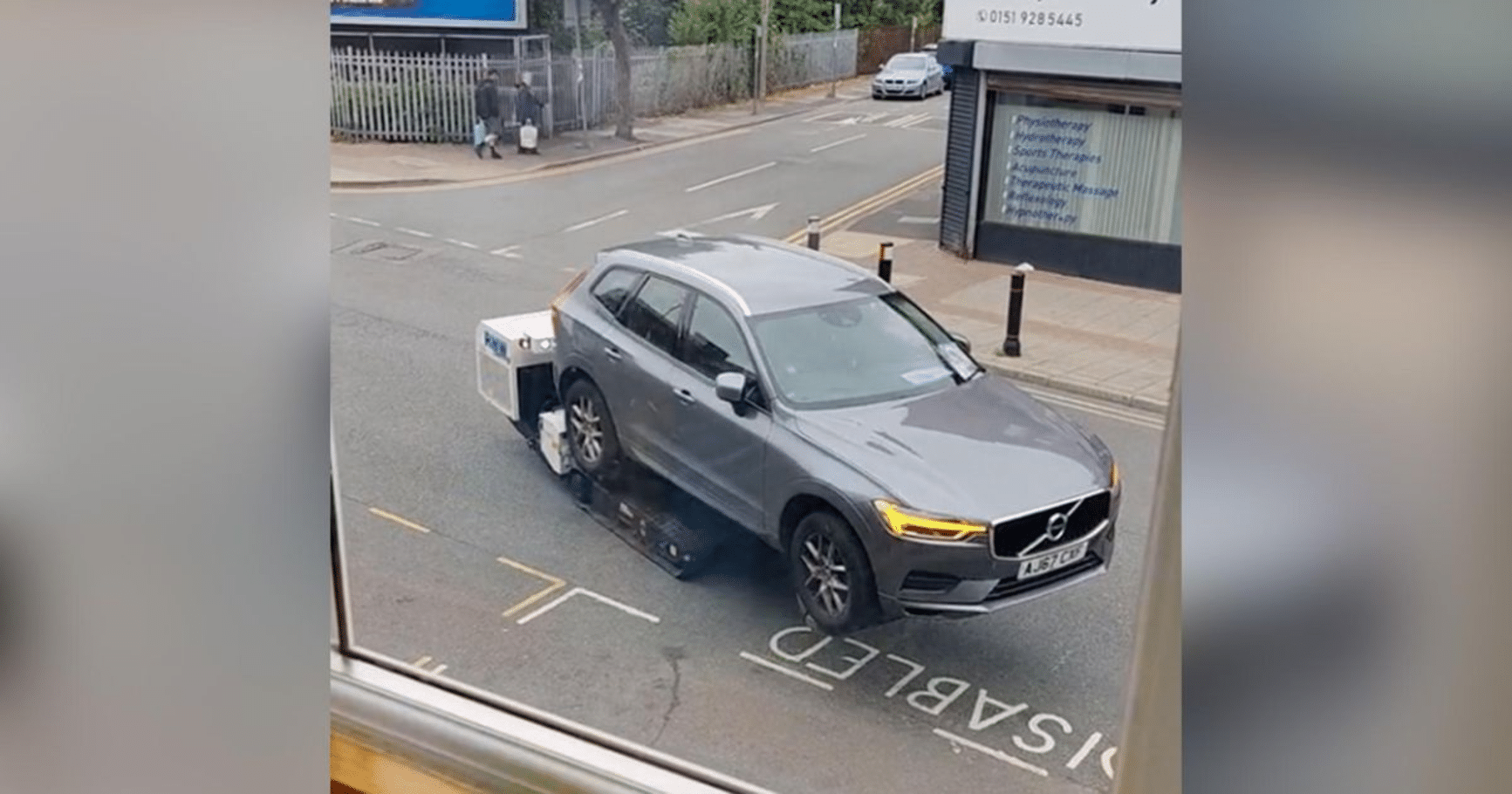 Robot Tow Truck Removes Illegally Parked SUV in Liverpool