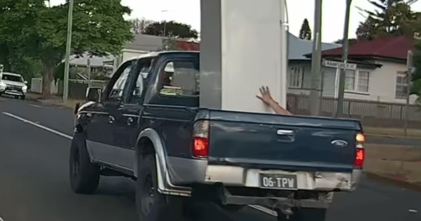 Unconventional and Illegal: Driver Caught Transporting Fridge in the Most Risky Way